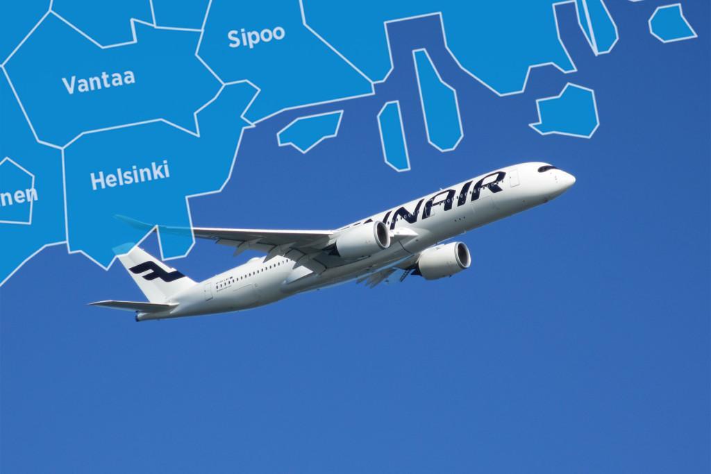 Finnairin lentokone sinisellä taivaalla.
