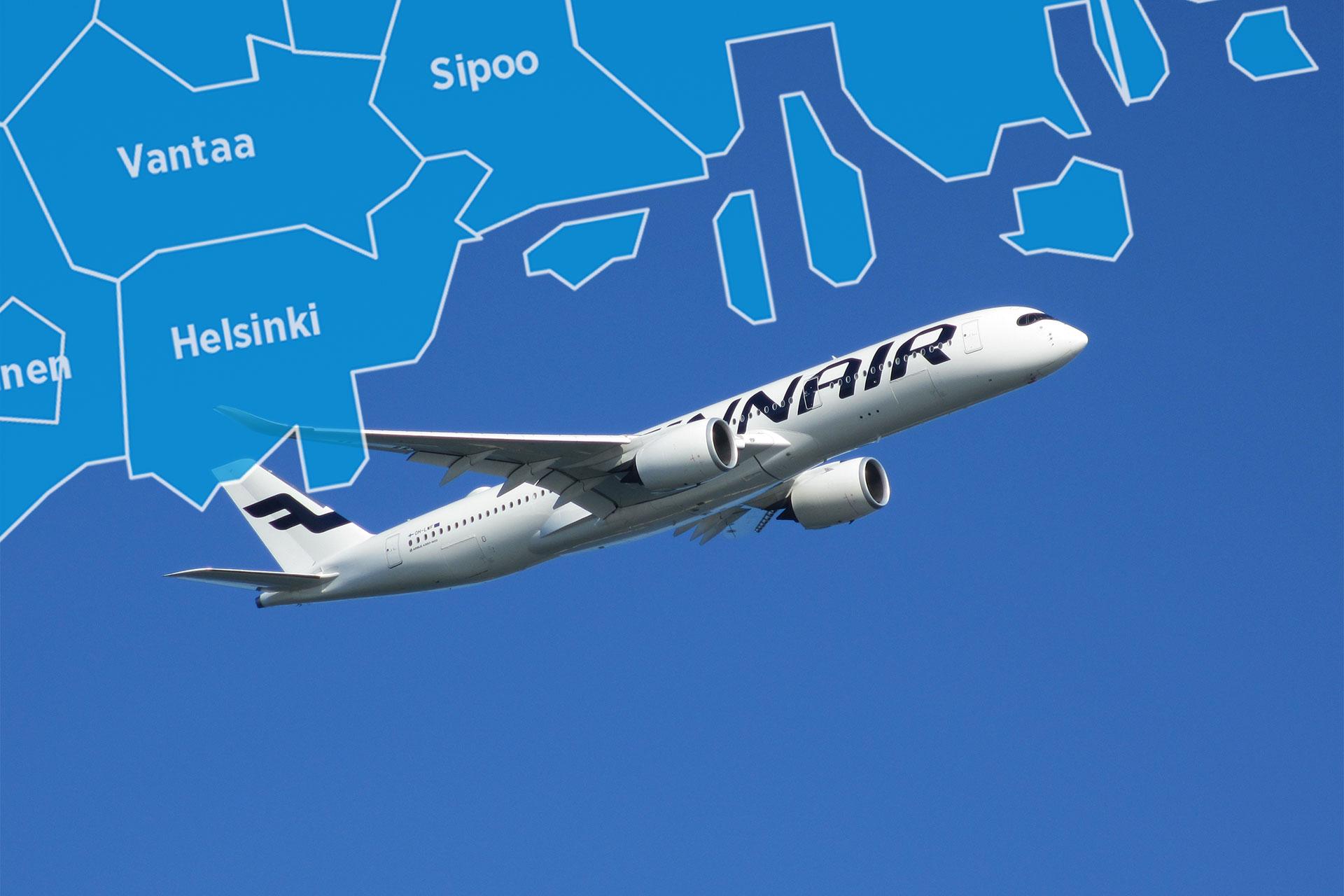 Finnairin lentokone sinisellä taivaalla.